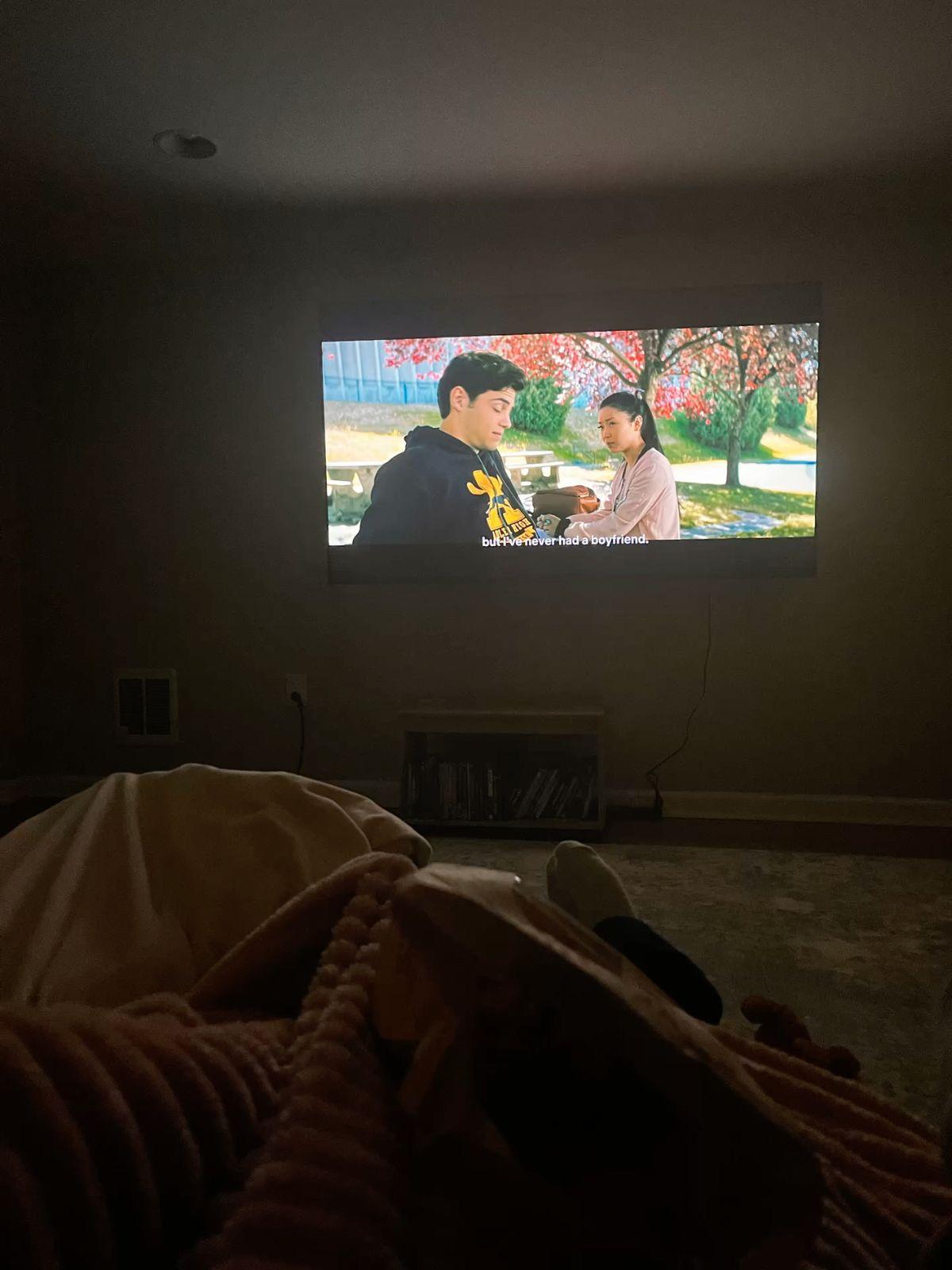 Couple watching a movie together on a video call